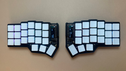 corne choc split keyboard with white chosfox cfx keycaps