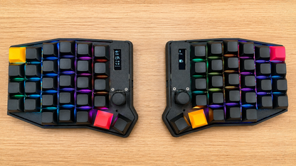 Sofle MX 58-key wireless split keyboard in black with DSA keycaps — top-down view